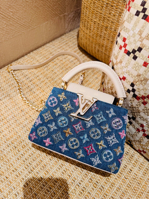 Mini borsa Capucines decorata in denim di lusso