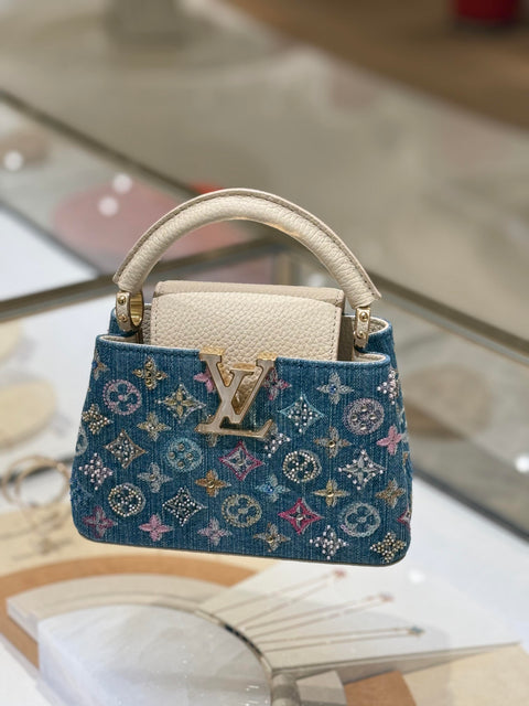 Mini borsa Capucines decorata in denim di lusso