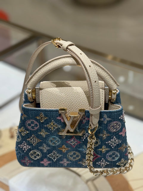 Mini borsa Capucines decorata in denim di lusso