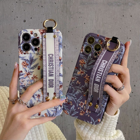 Modische iPhone-Hülle mit Armband in Lila und Weiß