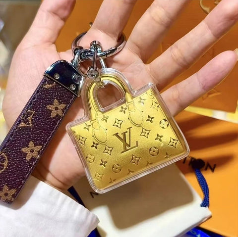 Porta-chaves Mini Bolsa Dourada