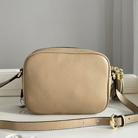 Sac bandoulière avancé en cuir grainé