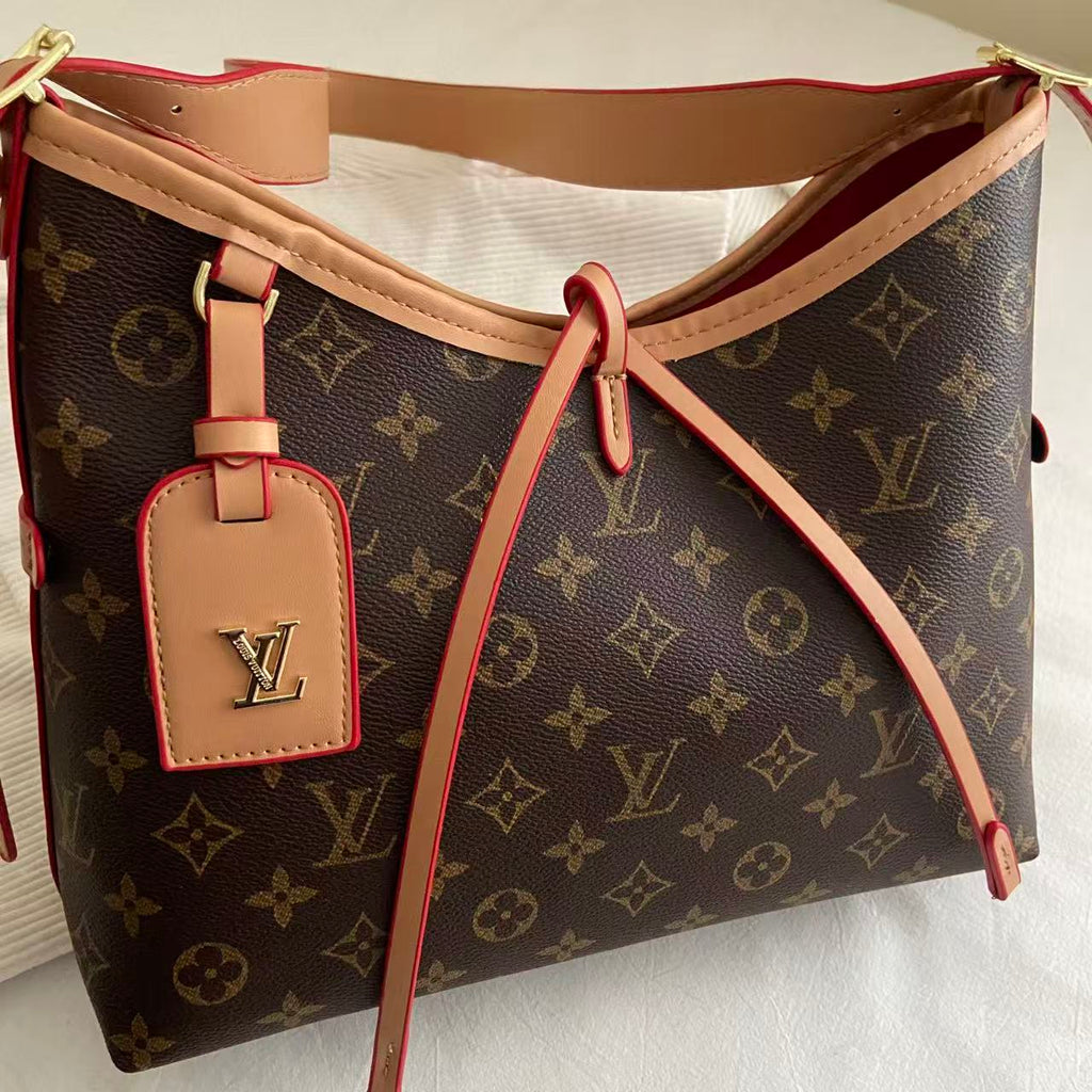 Monogram keresztpántos válltáska
