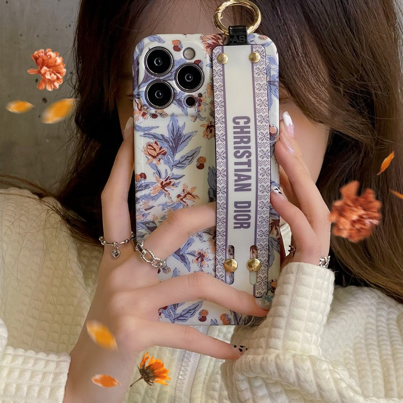 Modische iPhone-Hülle mit Armband in Lila und Weiß