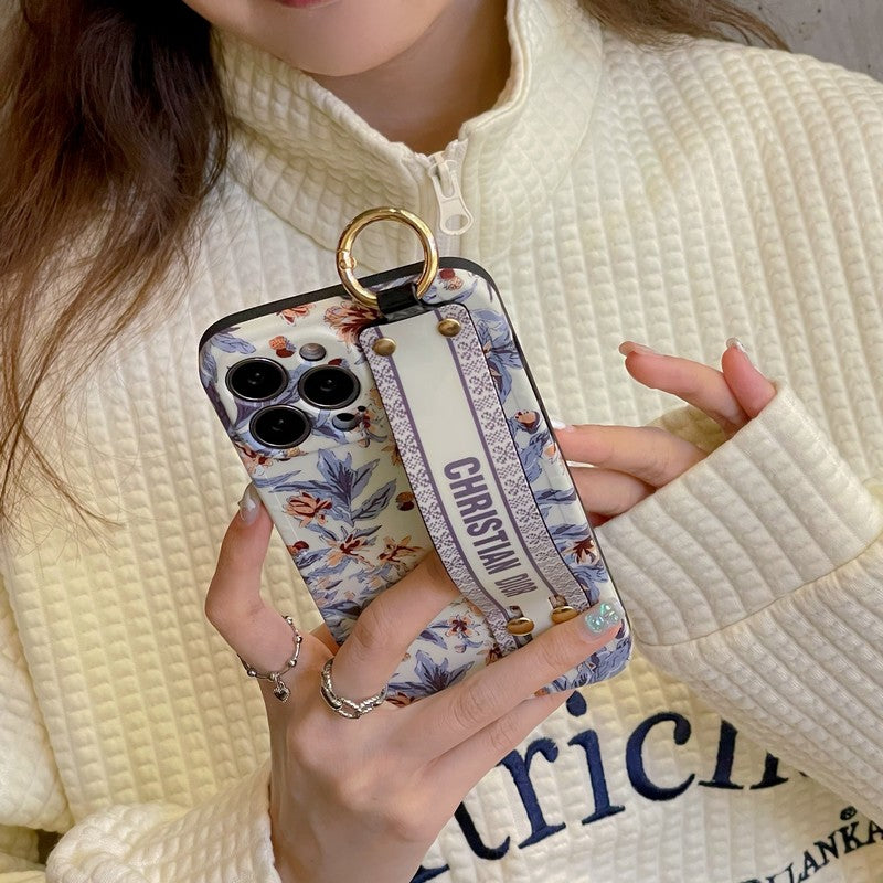 Modische iPhone-Hülle mit Armband in Lila und Weiß