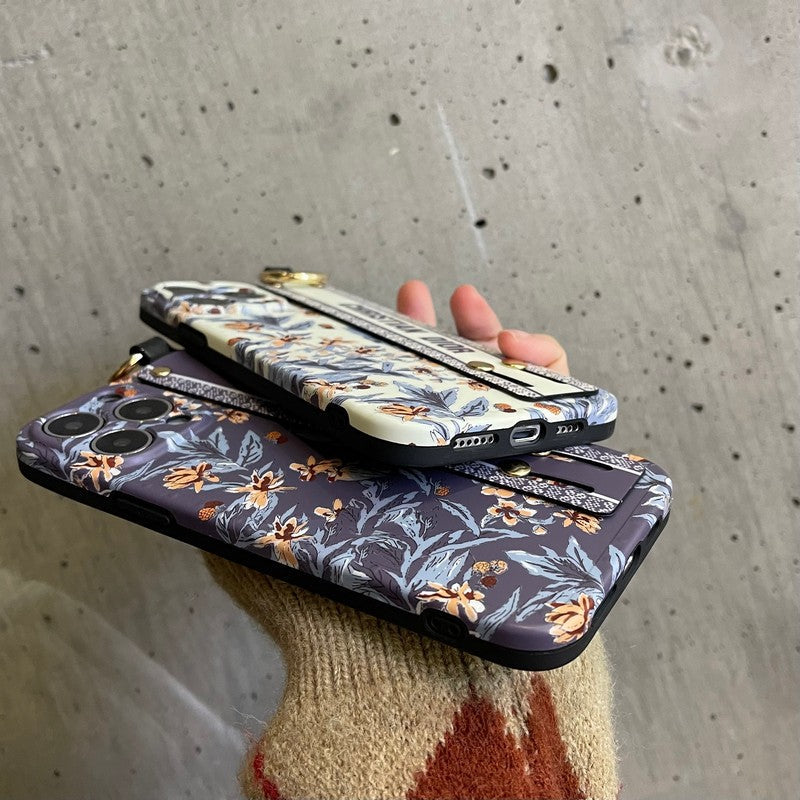 Modische iPhone-Hülle mit Armband in Lila und Weiß