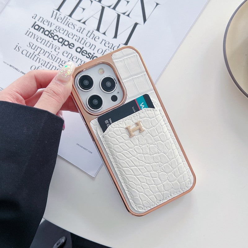 Capa para iPhone em couro dourado rosa H