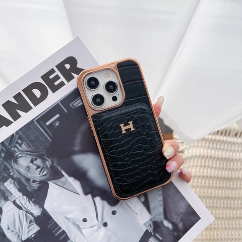 Capa para iPhone em couro dourado rosa H