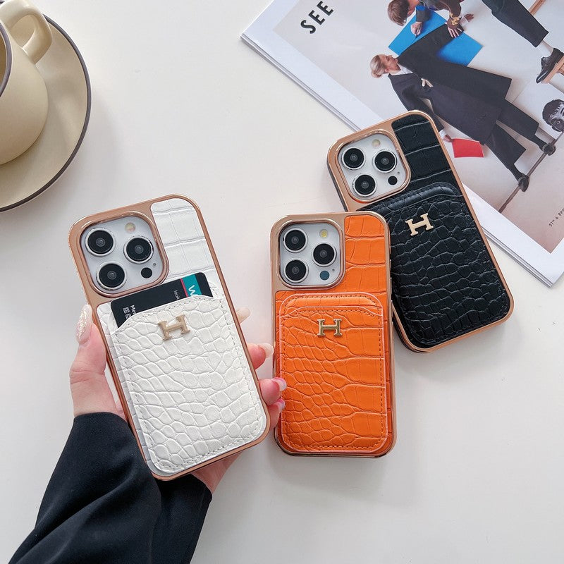Capa para iPhone em couro dourado rosa H