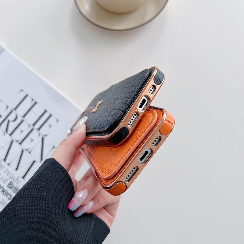 Capa para iPhone em couro dourado rosa H