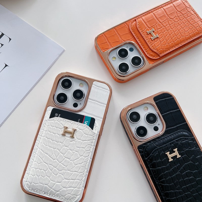 Capa para iPhone em couro dourado rosa H