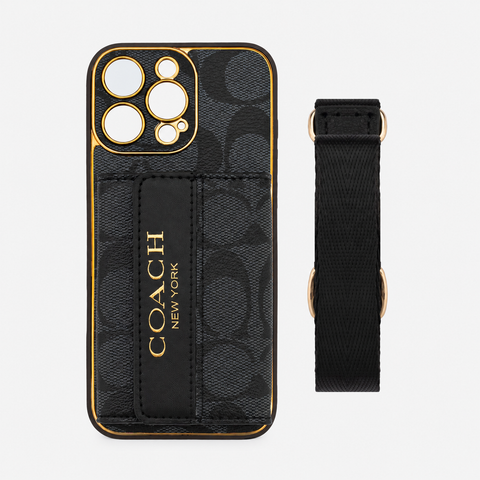 Black monogram iPhone case and black strap on light gray background