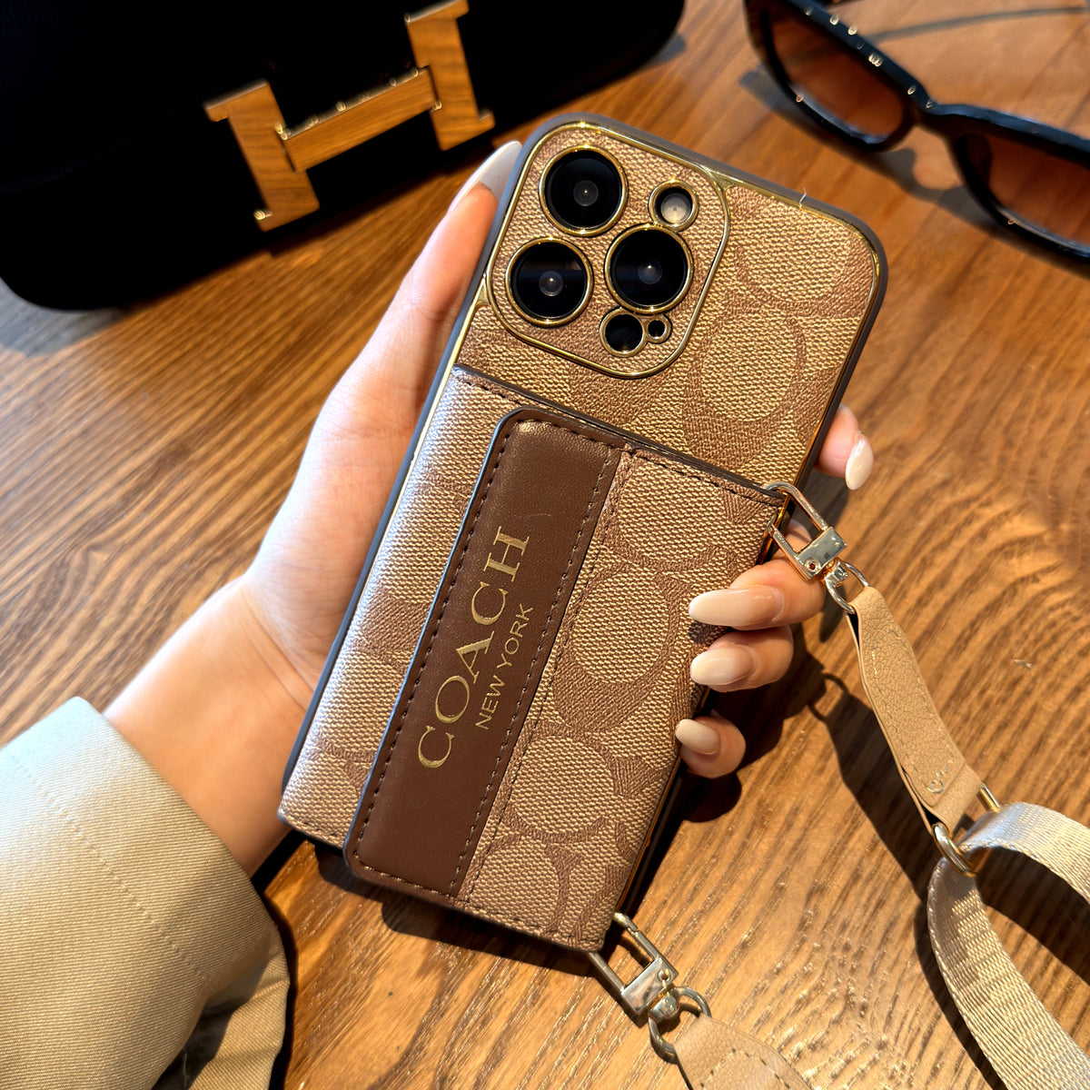 Brown monogram crossbody phone case detail 1