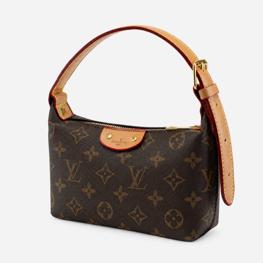 Brown monogram zip shoulder bag with adjustable tan strap on light gray background